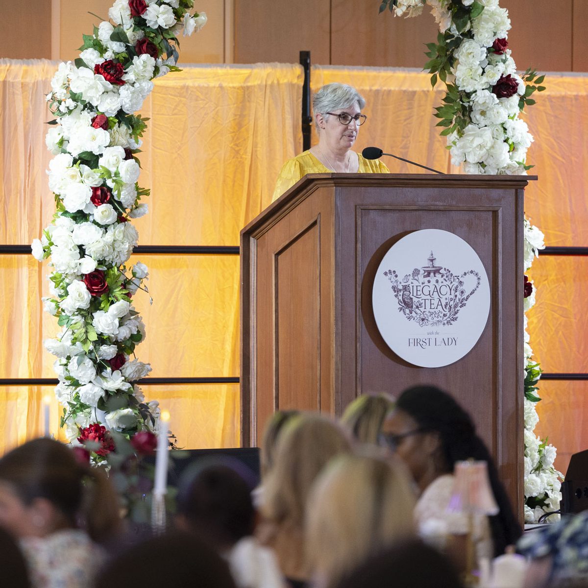 person talking form a lectern