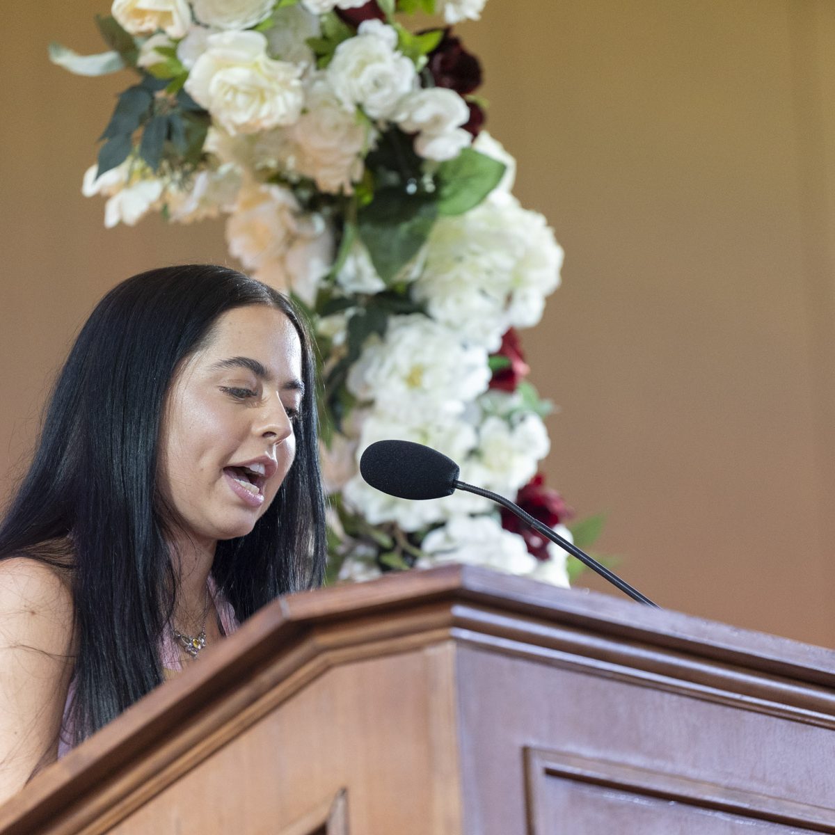 person talking from a podium