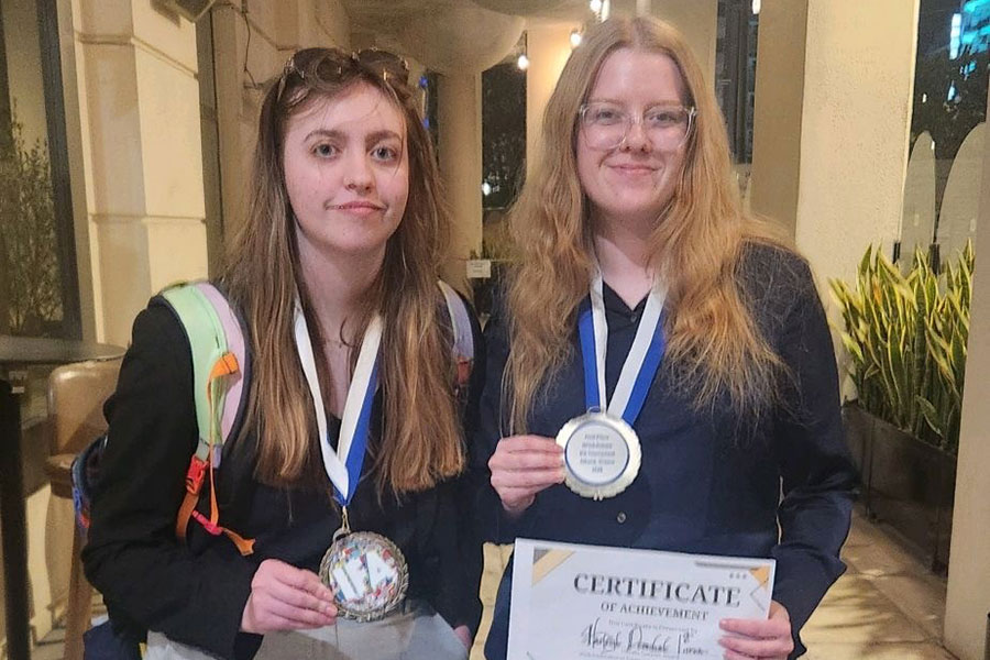 FSU students Zoey Rotenberry (left), a senior studying political science, and Harleigh Demchak (right), a junior studying economics, were named worldwide champions after competing at the International Forensics Association tournament in Athens, Greece. (Harleigh Demchak)