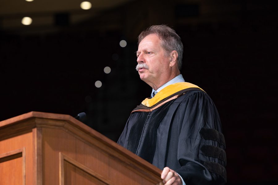 Assistant Provost for International Initiatives at Florida State University and Interim Dean of The Graduate School Steve McDowell speaks on stage from a podium.