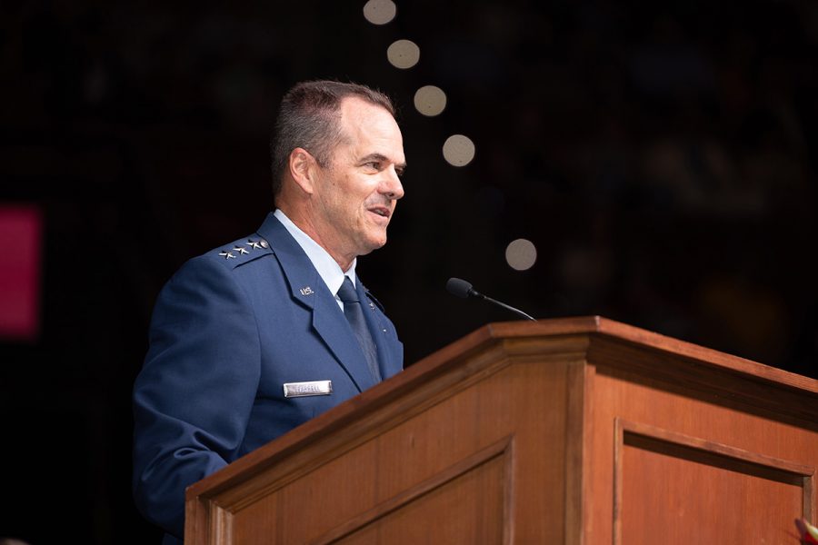 Lt. Gen Sean M. Farrell addresses graduates while standing on the stage.