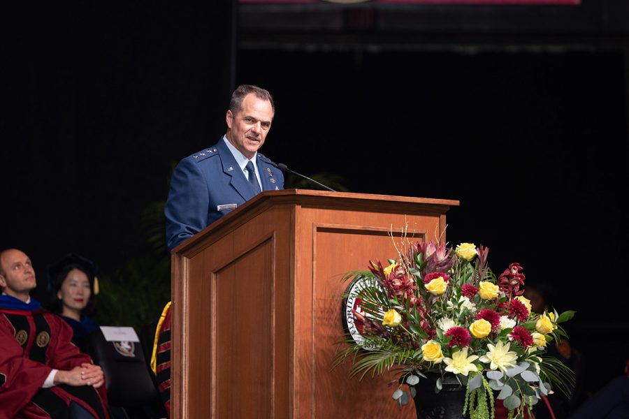 Lt. Gen. Sean M. Farrell speaks from the podium during Spring 2026 commencement.