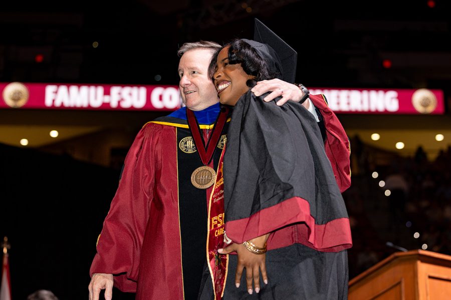 Florida State University President Richard McCullough congratulates a graduate during Spring 2026 commencement at the Donald L. Tucker Civic Center. (Bill Lax/Florida State University)