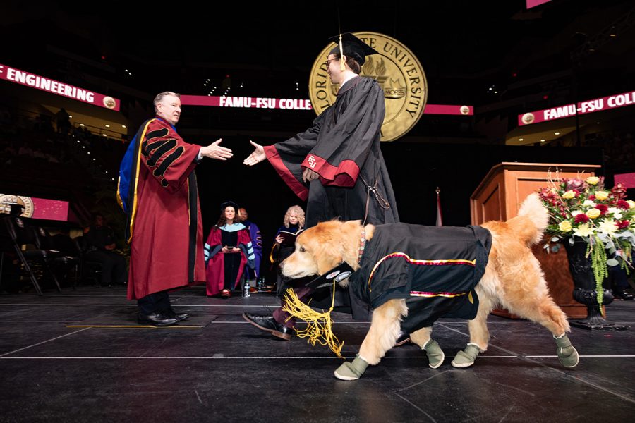 Florida State University President Richard McCullough congratulates a graduate during Spring 2026 commencement at the Donald L. Tucker Civic Center. (Bill Lax/Florida State University)
