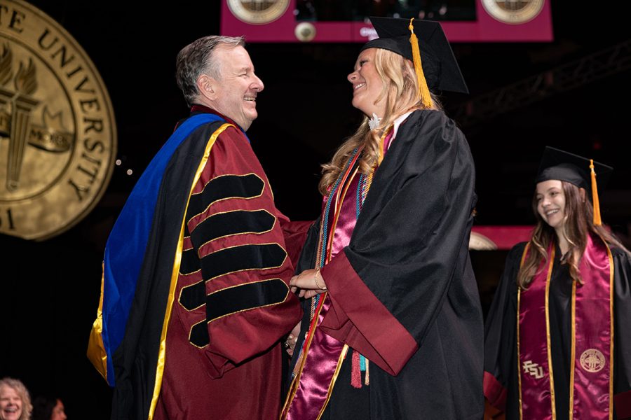 Florida State University President Richard McCullough congratulates a graduate during Spring 2026 commencement at the Donald L. Tucker Civic Center. (Bill Lax/Florida State University)