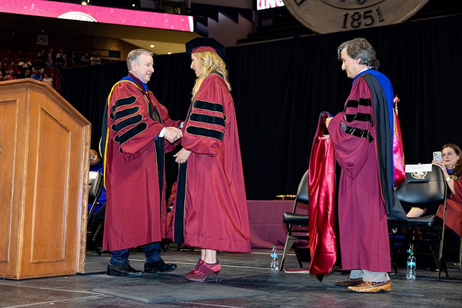 President Richard McCullough congratulates Sara Blakely on her honorary degree during spring commencement on May 1, 2026.