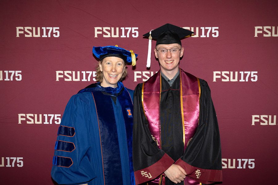 Michelle Kazmer, dean of the College of Communication and Information and professor in the School of Information, poses with her son Evan Marty at Florida State University’s Spring 2026 commencement ceremony Saturday, May 2, 2026, at the Donald L. Tucker Civic Center. (Bill Lax/Florida State University)