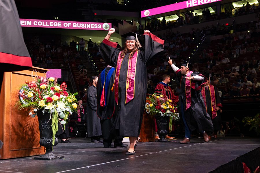 A Florida State University graduate celebrates during one of the Spring 2026 commencement ceremonies Saturday, May 2, 2026, at the Donald L. Tucker Civic Center.