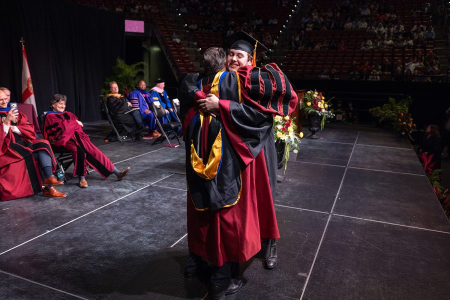 President Richard McCullough hugs Student Body President Carson Dale on stage during Spring Commencement on May 2, 2026.
