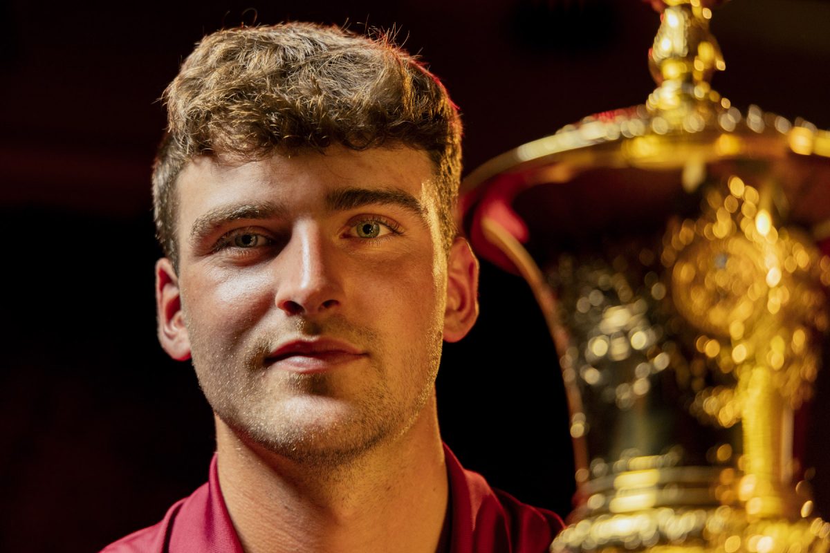 Jack Whaley poses with the Havemeyer Trophy