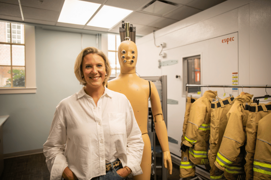 Photo of an FSU lab director and her thermal manikin used for research.