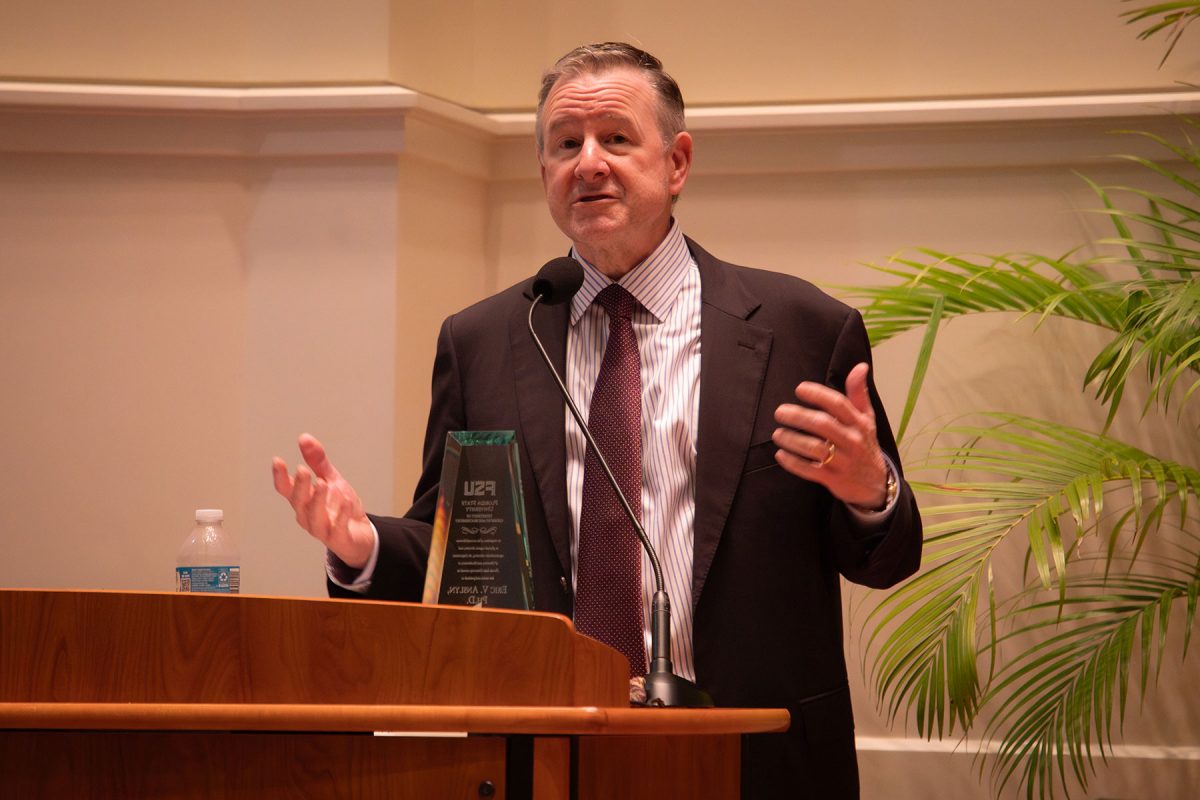 President Richard McCullough introduces Professor Eric Ansyln during the Presidential Lectureship in Chemical Sciences on Sept. 23, 2026. (Devin Bittner/Arts & Sciences)