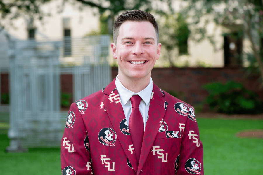 A man in a Florida State University suit.