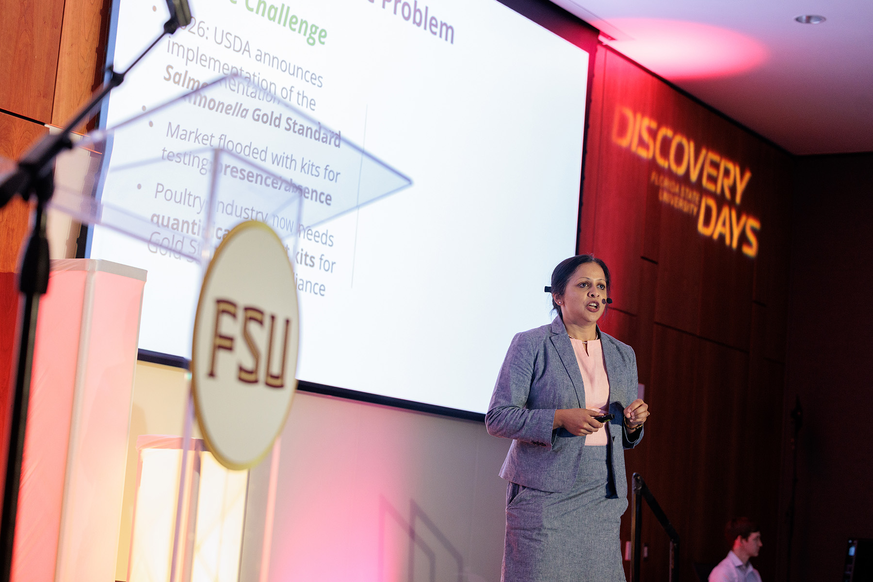 Anjli Kumar Singh explains her company on stage.
