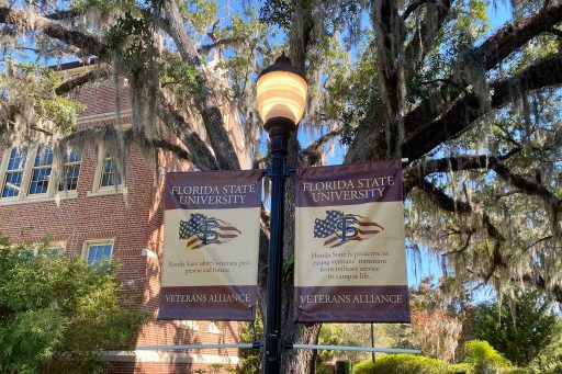 FSU Veterans Alliance Arrowhead logo on lightpole banners on campus.